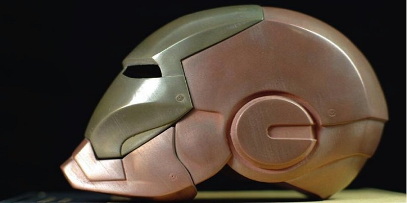 A 3D printed Ironman helmet, made of bronze and copper metal filaments.